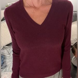 100% cashmere sweater in a wine color. Size Medium.